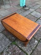 A LOW DROP END TABLE MADE FROM MAPLE WITH MAHOGANY INLAY 104 OR 50 X 80 X 40CM