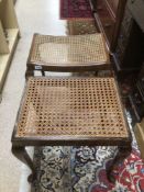 TWO VINTAGE MAHOGANY STOOLS WITH WICKER SEATING ON CABRIOLE LEGS