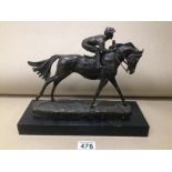 A BRONZE GROUP RACEHORSE AND JOCKEY ON SLATE 30CM