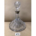 A HALLMARKED SILVER MOUNTED CUT GLASS SHIPS DECANTER 24CM