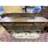 A HEAVY CARVED CONTINENTAL OAK BUFFET/SIDEBOARD 19TH CENTURY 217 X 121 X 60CM