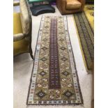 A 596 X 96CM TURKISH RUNNER/CARPET