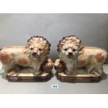 A PAIR OF CHINA LIONS 33 X 28CM