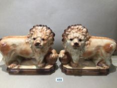 A PAIR OF CHINA LIONS 33 X 28CM