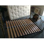 A FOUR FOOT SIX BRASS AMOURY BEDSTEAD WITH FRAME COMPLETE