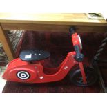 A TILDO BALANCE SCOOTER IN RED