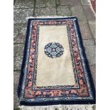 A VINTAGE CHINESE RUG 153 X 94CM