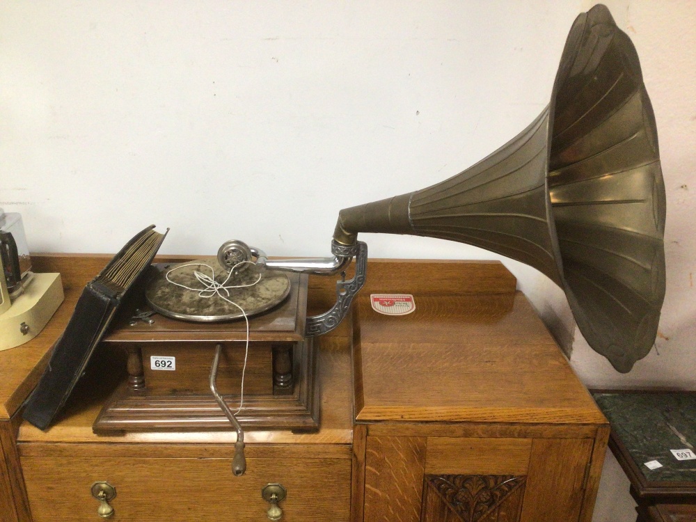 A VINTAGE HIS MASTERS VOICE REPRODUCTION GRAMOPHONE WITH RECORDS