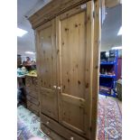 A MODERN PINE WARDROBE WITH TWO BOTTOM DRAWERS 109 X 60 X 198CM