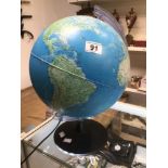 A LIGHT UP GLOBE ON STAND (GLOBE 27CM DIAMETER)