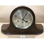 A JUNGHANS (WURTEMBURG B25) OAK CASED MANTLE CLOCK WITH A WESTMINSTER CHIME WITH A PRESENTATION