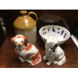 TWO CHINA STAFFORDSHIRE DOGS WITH A CHINA TAZZA AND A STONEWARE BOTTLE (DUNCAN GILMOUR AND CO)