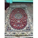 A LARGE WOOL RUG/CARPET 245 X 158 CM