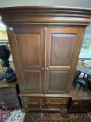 A VINTAGE DOUBLE WARDROBE WITH FOUR UNDER DRAWERS 200 X 115 X 52CM