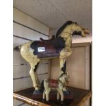 TWO VINTAGE CARVED WOODEN HORSES LARGEST 47 X 50CM
