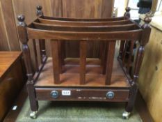 A VINTAGE MAHOGANY CANTERBURY WITH UNDER DRAWER