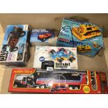 A COLLECTION OF VINTAGE REMOTE CONTROLLED TOY VEHICLES IN ORIGINAL BOXES, INCLUDES A MARX MIGHTY