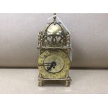 A SMITHS BRASS LANTERN-STYLE MANTEL CLOCK 19CM