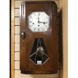 A JUTZI AUCHEL ART DECO WALL CLOCK WITH PENDULUM NO WEIGHTS 37 X 68CM