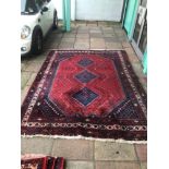 A VINTAGE WOOL RUG FROM IRAN 288 X 200CM