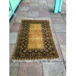 A VINTAGE AFGHAN RUG 164 X 104CM