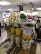 A FOUR-PERSON CHINESE DRAGON COSTUME COMPLETE WITH TROUSERS AND SHOES