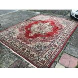 A LARGE PERSIAN RUG 362 X 273CM