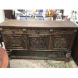 A LARGE CONTINENTAL OAK SIDEBOARD;/BUFFET 177 X 55 X 102CM