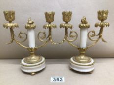 A PAIR OF WHITE MARBLE AND BRONZE GILT CANDELABRAS ON GILT FEET 20 CM