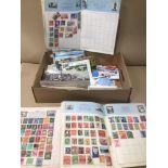 A QUANTITY OF POSTCARDS, HUMOROUS MILITARY AND MORE WITH VINTAGE STAMP ALBUM