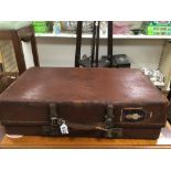A VINTAGE BROWN LEATHER REVELATION SUITCASE SOME INTERESTING LABELS ON THE CASE