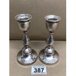 PAIR OF HALLMARKED WEIGHTED SILVER CIRCULAR BALUSTER CANDLESTICKS LONDON EDWARD BARNARD AND SONS