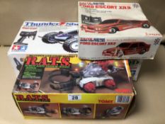 THREE BOXED REMOTE CONTROL TOYS, THUNDER SHOT BY TAMIYA, FORD ESCORT XR3 BY TAIYO, AND R.A.T.S BY