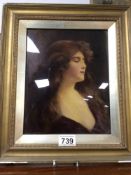 A FRAMED ANTIQUE CRISTOLEAN REVERSE PAINTING ON GLASS OF A LADY 32 X 37CM