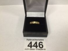 A MODERN 18CT BAND RING SET WITH NINE DIAMONDS, HALLMARKED FOR 2001 SIZE K1/2, 5 GRAMS UK P&P £15