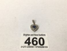 A VINTAGE YELLOW METAL AND DIAMOND PENDANT WEAR TO CENTRAL BLUESTONE, UK P&P £15