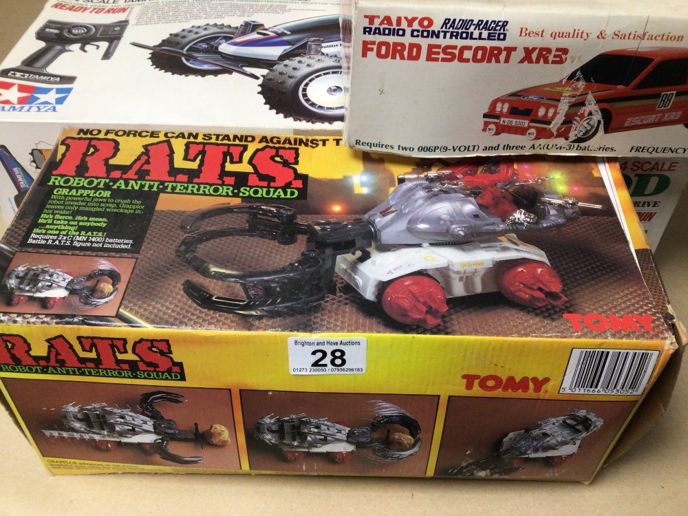 THREE BOXED REMOTE CONTROL TOYS, THUNDER SHOT BY TAMIYA, FORD ESCORT XR3 BY TAIYO, AND R.A.T.S BY - Image 2 of 8