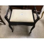 A VICTORIAN PIANO STOOL WITH STORAGE