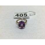 A MARKED 9CT GOLD RING WITH A LARGE SINGLE AMETHYST SIZE N