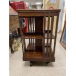 A VICTORIAN WOODEN REVOLVING BOOKCASE