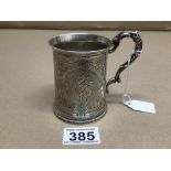 A VICTORIAN PEROID HALLMARKED SILVER ENGRAVED CIRCULAR CHRISTENING MUG WITH A SEAHORSE HANDLE BY