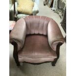 A HEAVY CARVED PINK VELVET TUB CHAIR