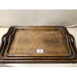 A GRADUATE SET OF VINTAGE OAK AND COPPER TRAYS, UK P&P £20