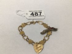 A VINTAGE HALLMARKED 9CT GOLD BRACELET WITH HEART PENDANT AND SILVER SHOES CHARM 7G, UK P&P £15