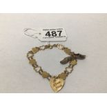 A VINTAGE HALLMARKED 9CT GOLD BRACELET WITH HEART PENDANT AND SILVER SHOES CHARM 7G, UK P&P £15