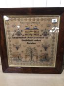 A 19TH CENTURY FRAMED AND GLAZED SAMPLER BY ANN JANE WILLIAMS AGED 12 DATED 1851 "PREPARE TO MEET