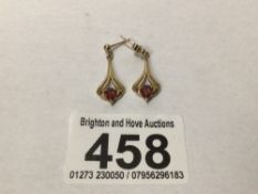 A 9CT GOLD AND GARNET EARRINGS HALLMARKED TO POSTS ONE BUTTERFLY MISSING, UK P&P £15