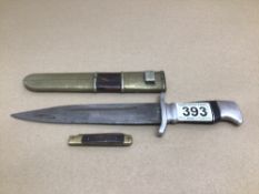 A DAGGER WITH SHEATH MADE FROM BRASS AND TORTOISESHELL WITH A BRASS AND WOOD FRUIT KNIFE