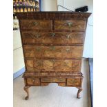 A GEORGE I WALNUT AND FRUITWOOD VENEERED CHEST ON STAND 150 X 98CM