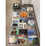 A LARGE COLLECTION OF VINYLS INCLUDING BLONDIE, LIONEL RICHIE, LENNON AND MCCARTNEY, DIRE STRAITS